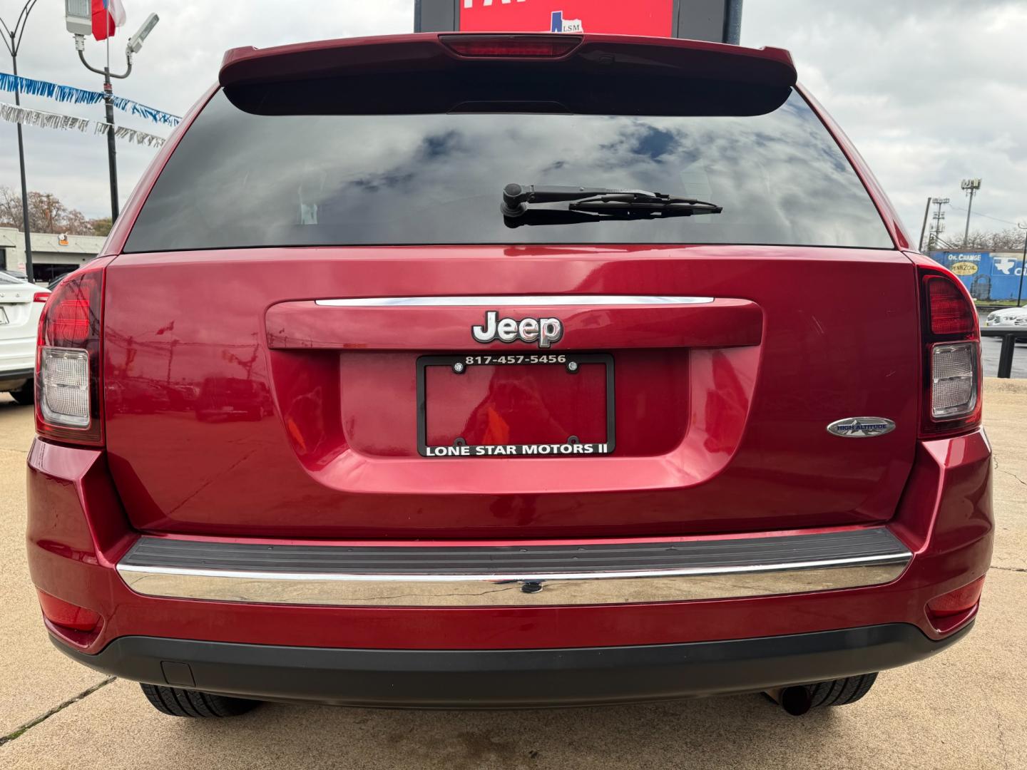 2014 RED /Black JEEP COMPASS LATITUDE Latitude 4dr SUV (1C4NJCEA3ED) with an 2.0L I4 engine, CVT transmission, located at 5900 E. Lancaster Ave., Fort Worth, TX, 76112, (817) 457-5456, 0.000000, 0.000000 - This is a 2014 JEEP COMPASS Latitude 4 DR SUV that is in excellent condition. The interior is clean with no rips or tears or stains. All power windows, door locks and seats. Ice cold AC for those hot Texas summer days. It is equipped with an AM/FM radio, AUX port, Bluetooth connectivity and Sirius X - Photo#4